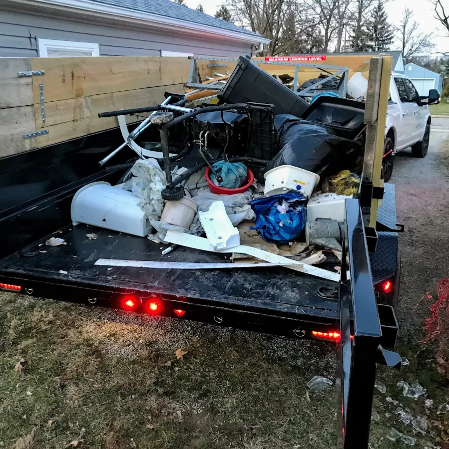 Roll-off dumpster delivered to a residential driveway in Farmington
