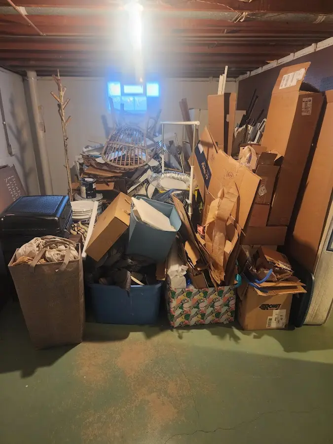 Roll-off dumpster container at job site for Yard Waste Dumpster Rental in Farmington